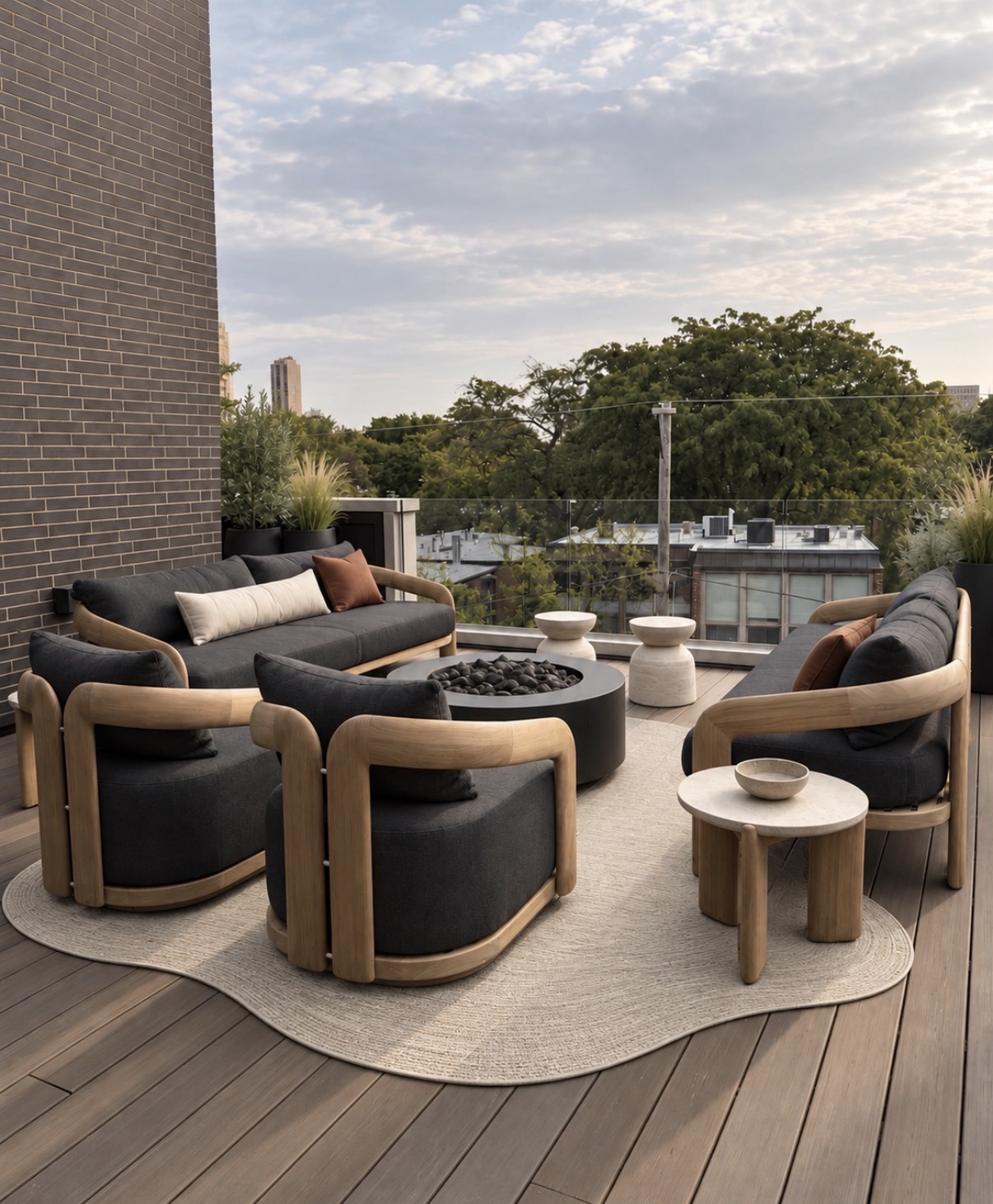 Howe Street patio with sculptural teak furniture, black bouclé and travertine tables
