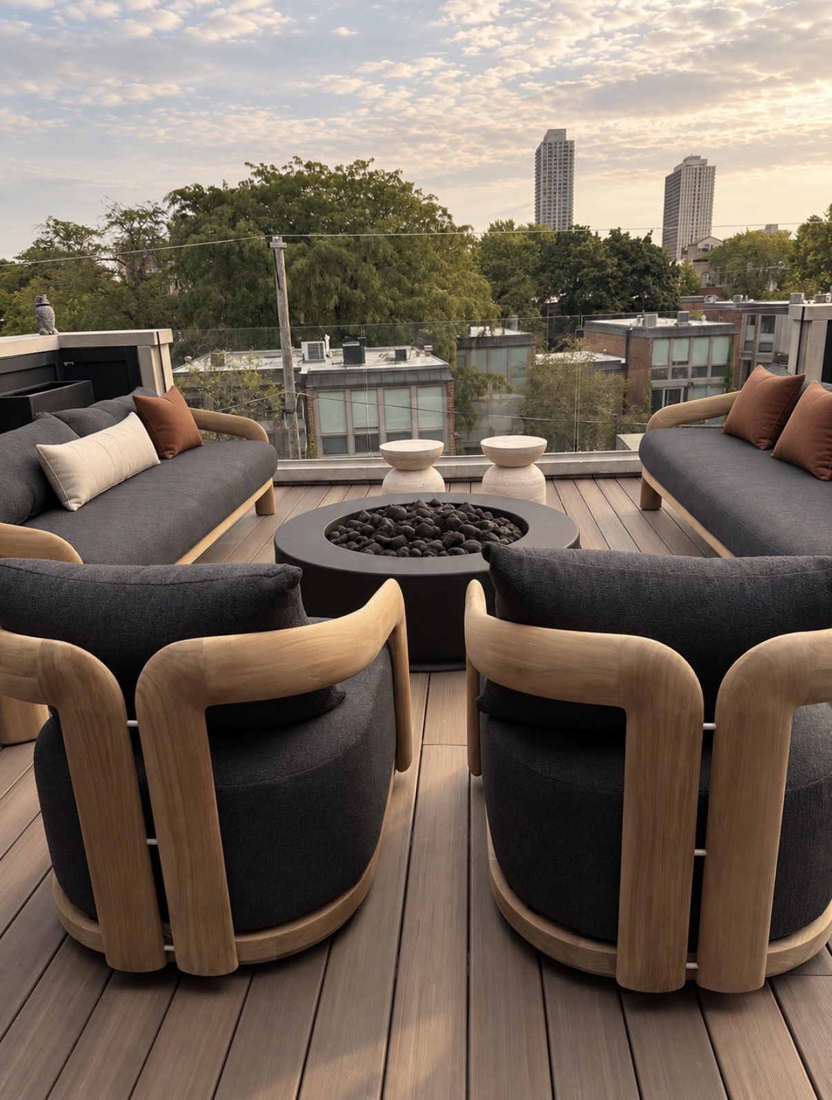 Howe Street patio with sculptural teak furniture, black bouclé and travertine tables